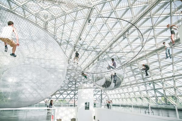 image of Saraceno hanging nets with people walking on them