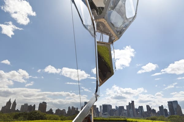 image of cloud cities installation on the Met rooftop, with people interacting with it