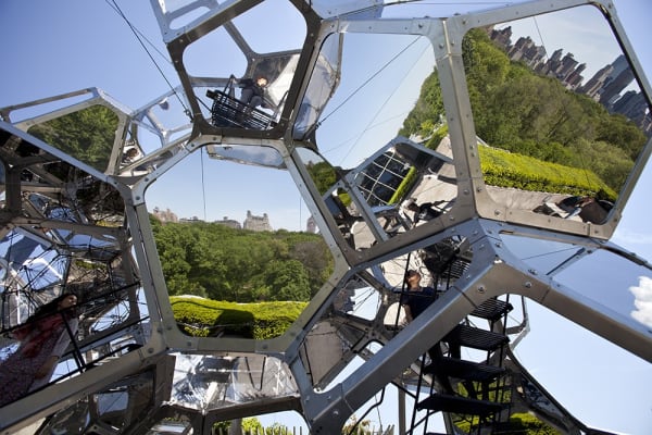 image of cloud cities installation on the Met rooftop, with people interacting with it