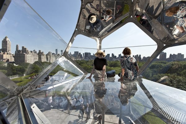 image of cloud cities installation on the Met rooftop, with people interacting with it