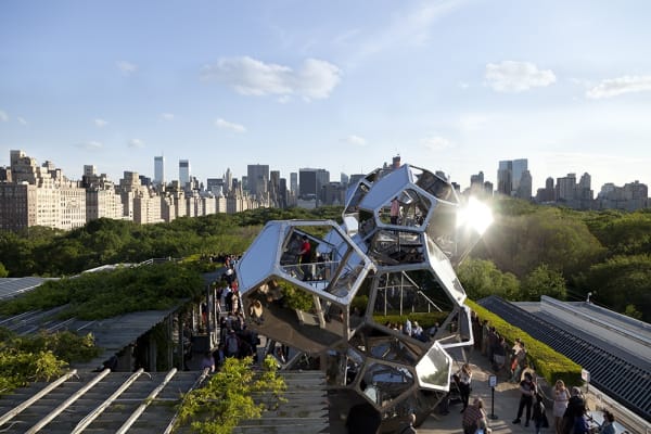 image of cloud cities installation on the Met rooftop, with people interacting with it