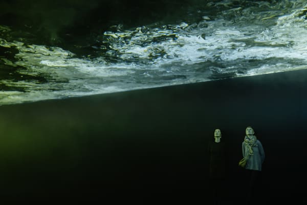 image of ceiling lit up with cloud like formations