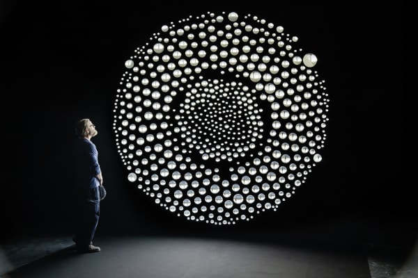 image of a geometric sphere made of smaller spheres