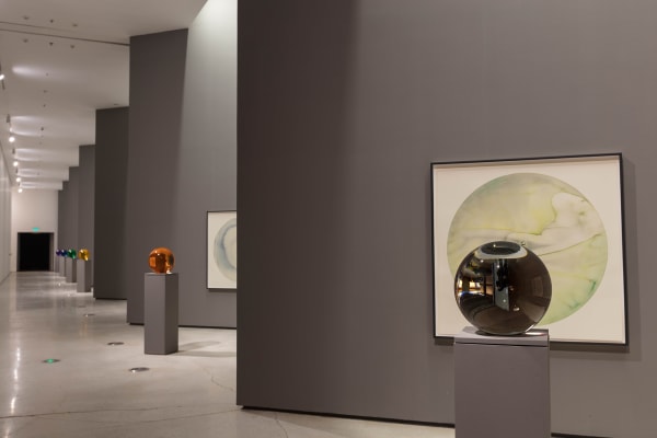 image of circular watercolors and circular crystal sphere