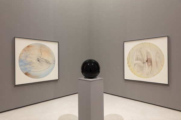 image of circular watercolors and circular crystal sphere