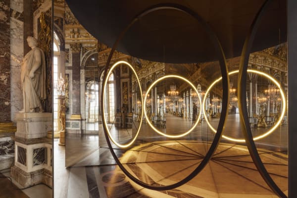 image of mirror and circular light sculpture