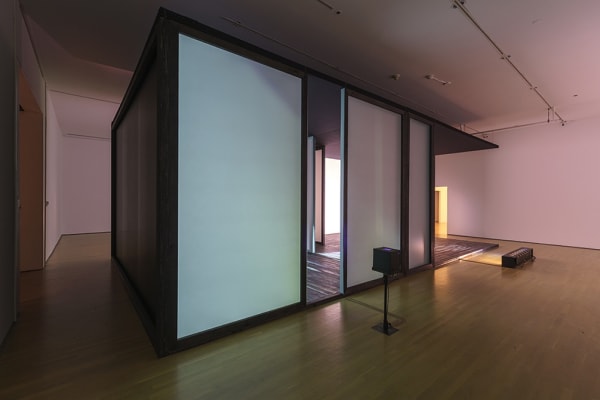 room with lights creating shadows of people