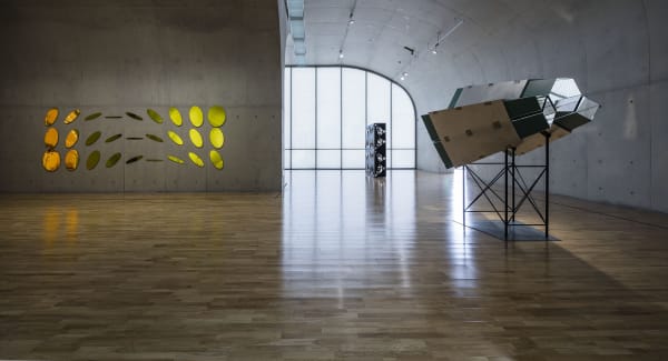 image of installation of yellow mirror discs