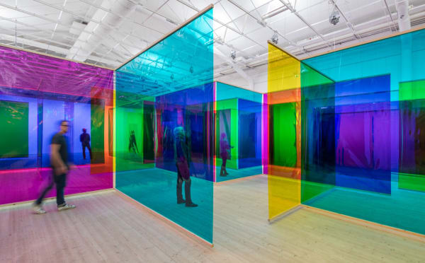 Image of a room with colorful transparent dividers