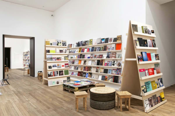 installation image of Meschac Gaba works at Tate, bookstore stand