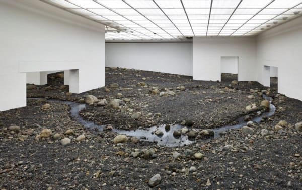 image of Olafur Eliasson installation, riverbed inside of museum
