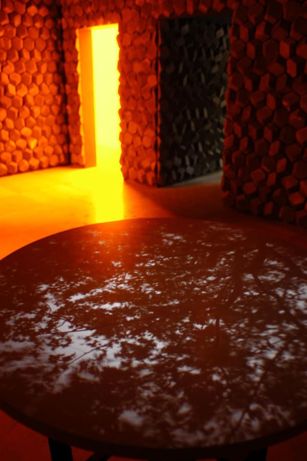 image of brick wall with yellow light