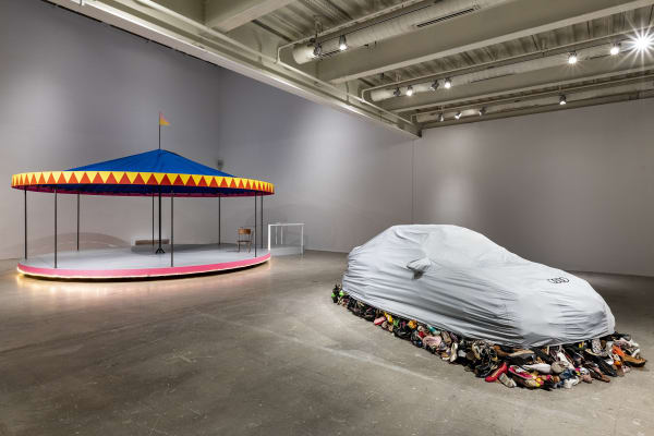 image of Karyn Olivier carosel and car cover sculptures