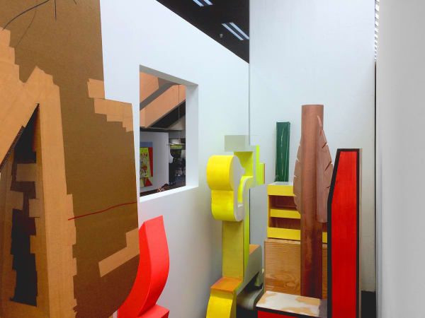 image of Scheibitz installation of paintings and sculptures