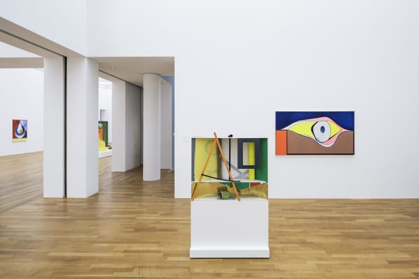 image of Scheibitz installation of paintings and sculptures