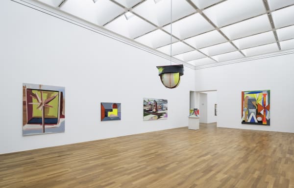 image of Scheibitz installation of paintings and sculptures