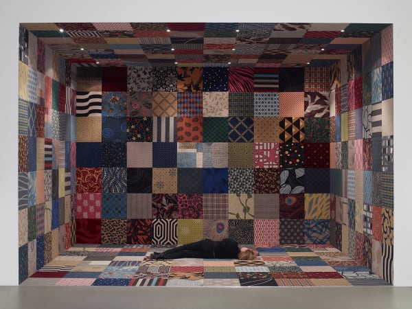image of carpeted room with text