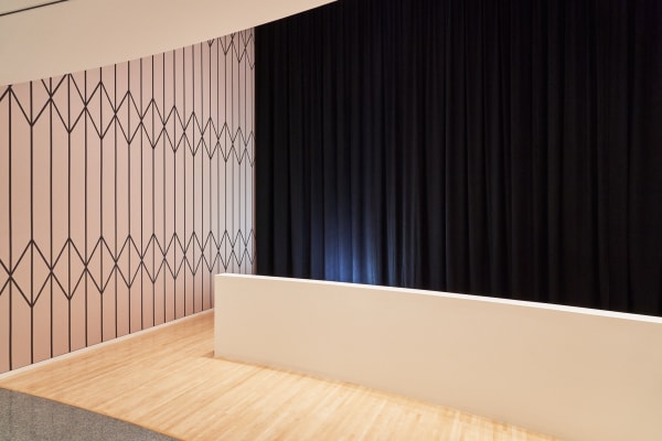 Installation images of Math Bass: a picture stuck in the mirror.