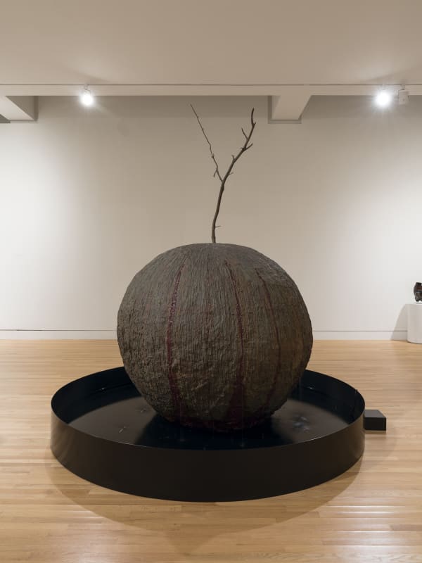 sculptures spaced out in a gallery with white walls and wood floor