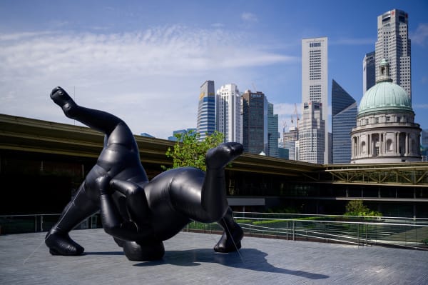 Shilpa Gupta's Untitled inflatable sculpture installed outdoors with cityscape backdrop