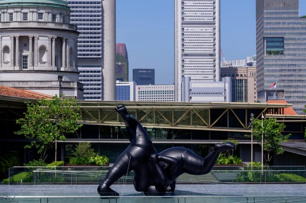 Shilpa Gupta's Untitled inflatable sculpture installed outdoors with cityscape backdrop