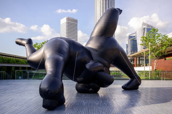 Shilpa Gupta's Untitled inflatable sculpture installed outdoors with cityscape backdrop