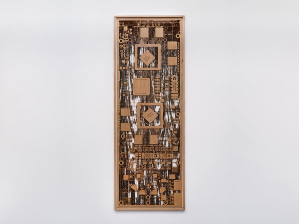 Wooden sculpture on white wall