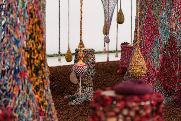 Installation view of ERNESTO NETO: Nosso Barco Tambor Terra [our boat drum earth].