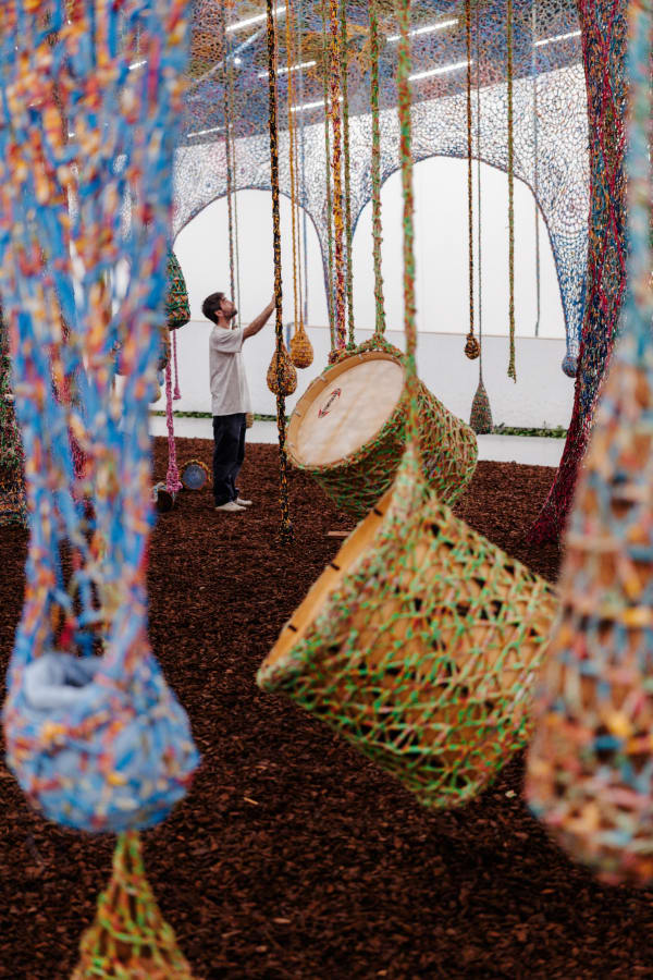 Installation view of ERNESTO NETO: Nosso Barco Tambor Terra [our boat drum earth].