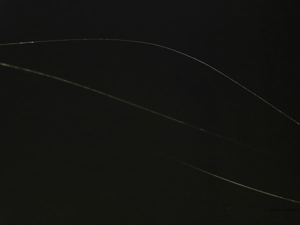 Saraceno 3 spider web threads in the dark