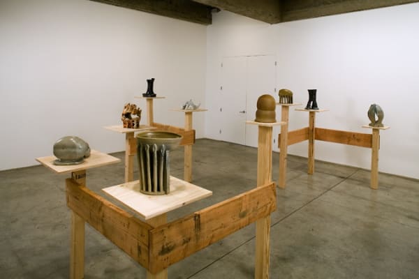 Ceramics on wood pedestals