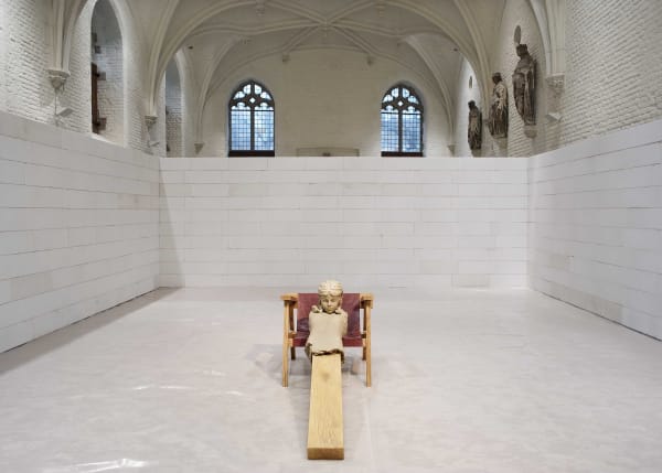 image of mark manders sculptures inside a concrete room block