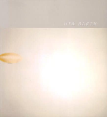 Exhibition catalogue cover for 2002 Uta Barth LA MoCA exhibition. Soft gray rectangle with light grey text "Uta Barth" above beige background with small round yellow shape.