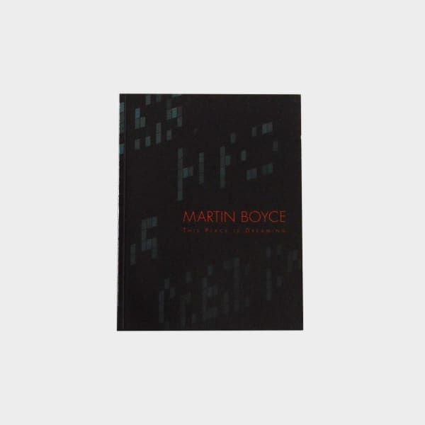 Martin Boyce exhibition catalogue cover. Red text reads "Martin Boyce: This Place is Dreaming" on a black background with illegible digital sign letters in a dark blue-gray.