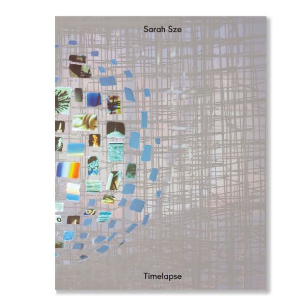 silver book cover with Sarah Sze's sculptural installation