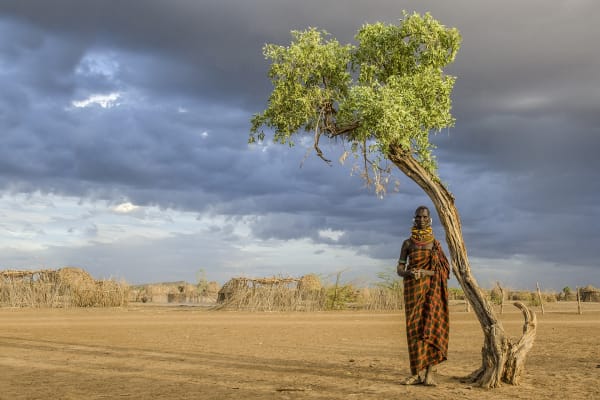 Carol Beckwith & Angela Fisher | Turkana Woman by Tree, Kenya | 2014