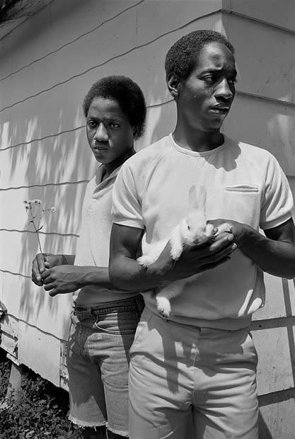 Sage Sohier, Young men with rabbit, Baton Rouge, Louisiana, 1983, from 'Animals'