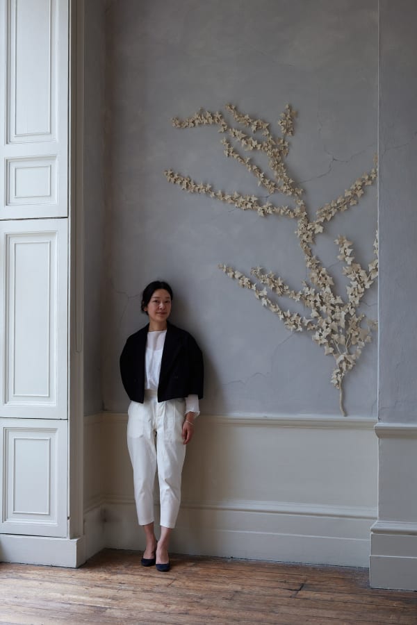 Kaori Tatebayashi with her 'Ivy' (2023) installation at Tristan Hoare Gallery. Image by Tom Carter.
