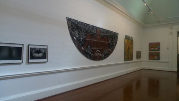 installation shot of an exhibition of the Without Masks Collection.