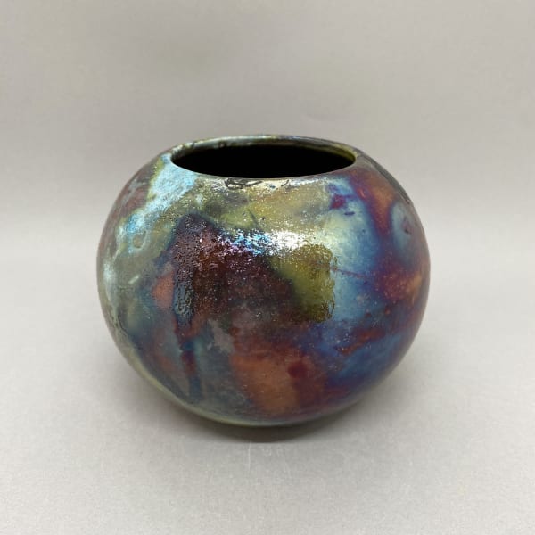 Katie Coston of Illyria Pottery raku fired round vase