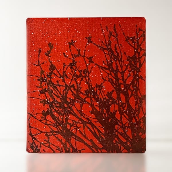Helen Slater glass sculpture with sepia drawing of winter hedgerow in light red and opaline glass