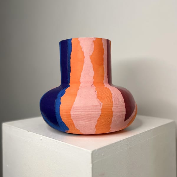 Eddie Knevett ceramic vessel designed with shaped in colours pink, blue, and orange