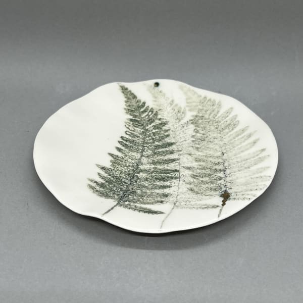 Fliff Carr white ceramic plate with 3 fern leaves printed in green in centre