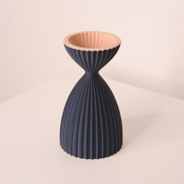 Keeley Traae 3d printed PLA vase in a pinched curve shape and dimensional zig-zagged texture, ink and marshmallow