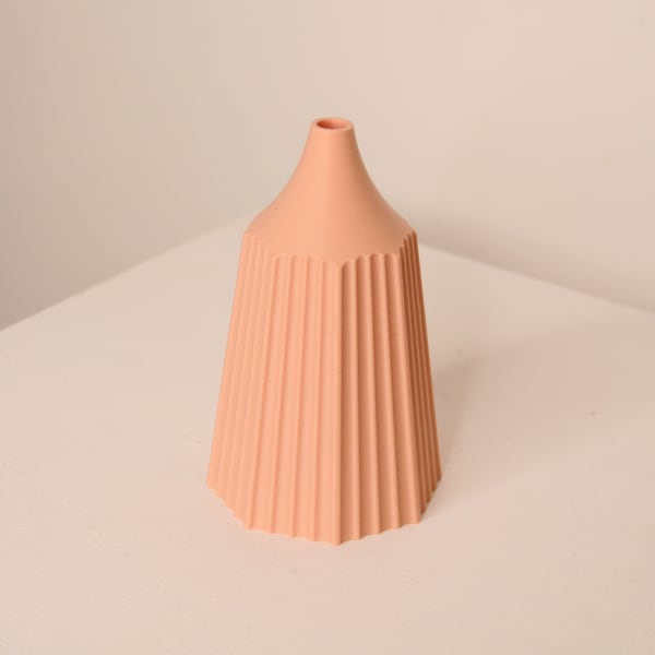 Keeley Traae 3d printed pla vase with incised line detail in a pencil shape in the colour marshmallow