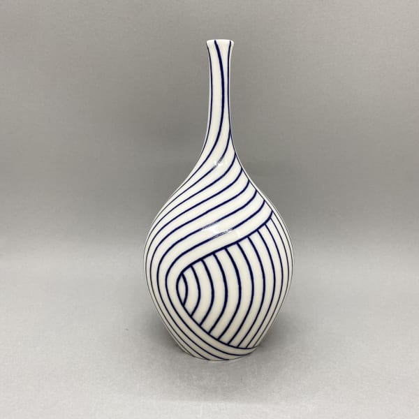 Rhian Malin medium white bottle vase with layered blue lines design.