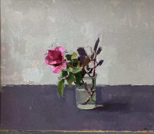 Sarah Spackman oil painting of a single vivid pink rose resting in a glass of water, against a grey background
