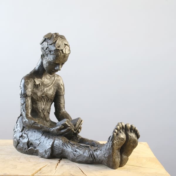 Carol Peace sculpture of a female figure sat reading