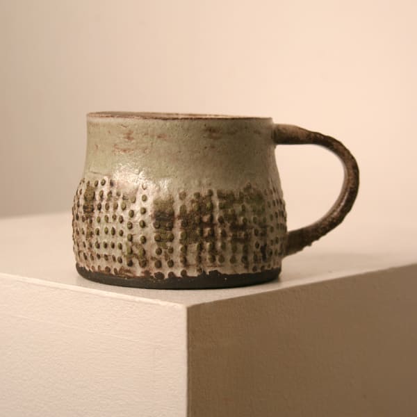 Elly Wall stoneware ceramic mug with raised bumped texture and sage green glaze