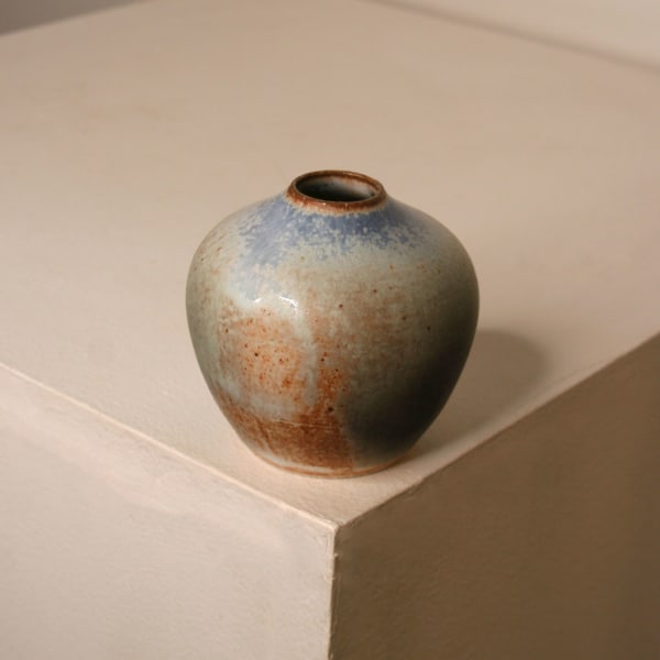 Atilla Olah ceramic mini vase in a variety of blue, green, grey and copper glaze colours